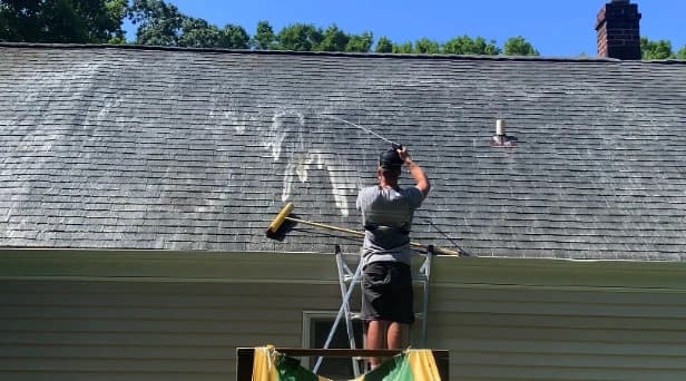 Before and after results of roof washing by Westlake Power Washing in Westlake