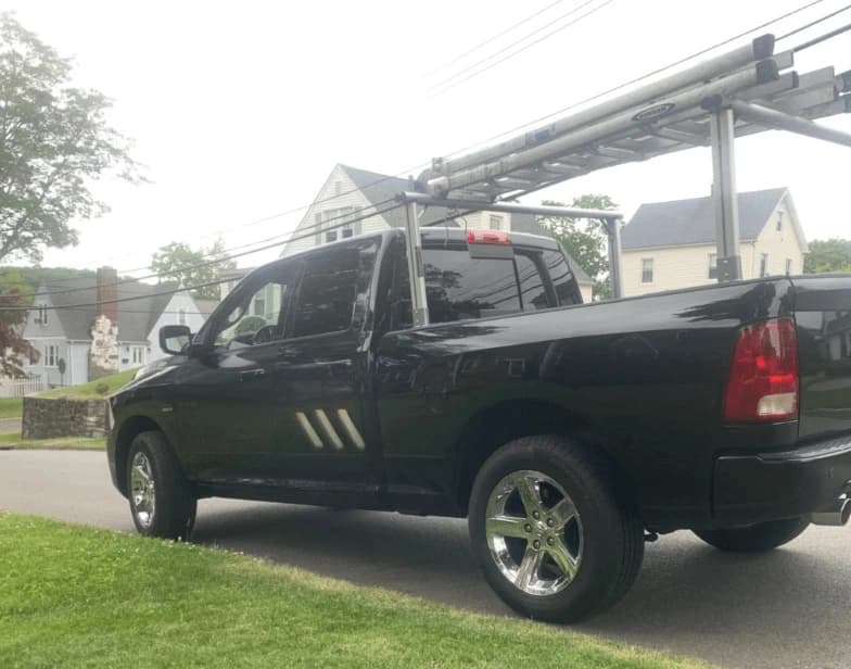 Fleet vehicle cleaning service being performed by Westlake Power Washing in Westlake