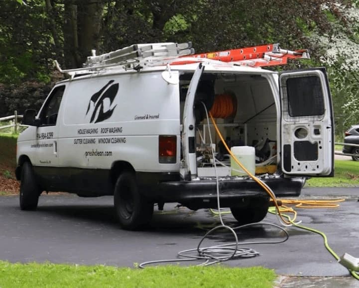 Westlake Power Washing professionals cleaning commercial fleet in Westlake